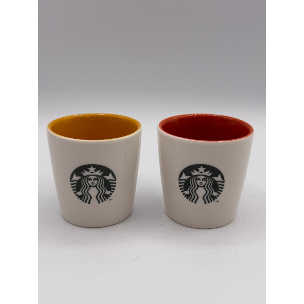 Starbucks Espresso Shot Glass Set of 2 Ceramic White Orange Yellow Siren Logo